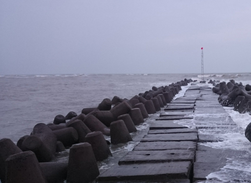 Mohona with a view of the sea and a rocky pier