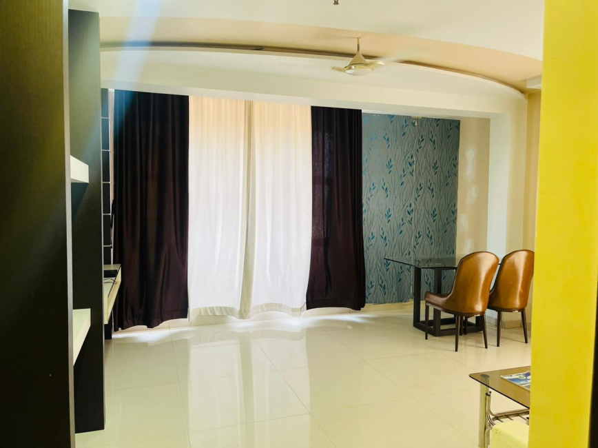 Room with a bed and a sofa