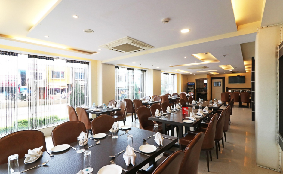 Restaurant with tables set for dining