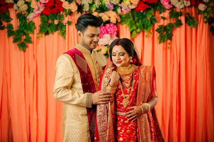 Indian bride and groom in traditional attire at a hotel wedding