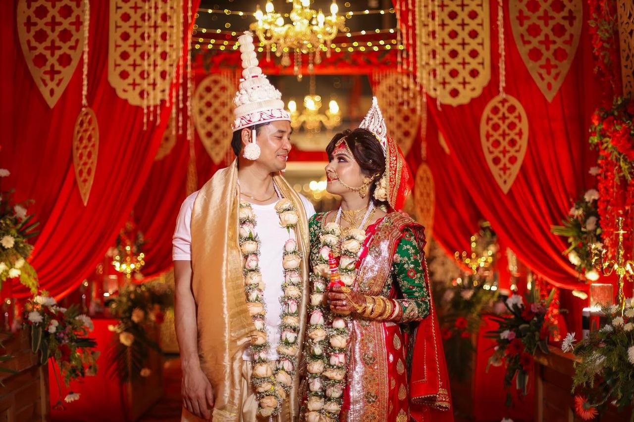 Indian wedding banquet setup with tables and decorations in a hotel