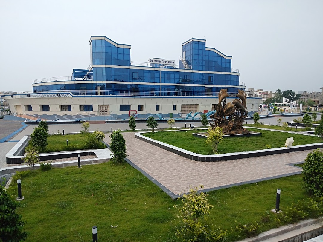 A modern conference room with a large table and chairs, with a city view through the window